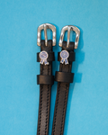 Black leather ManeJane spur straps with silver buckles and blue prize-ribbon rosette charms