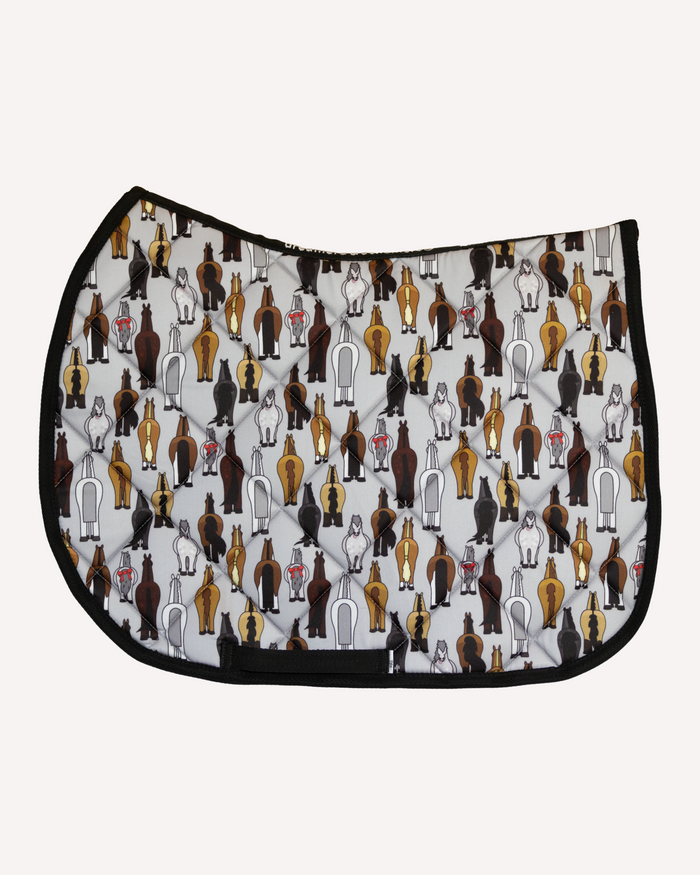 Butts saddle pad in grey printed with cartoon horse rear ends, English pad shown flat by Dreamers & Schemers