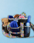 Feeling Stable grooming tote packed with brushes, sponges and a comb, by Dreamers & Schemers