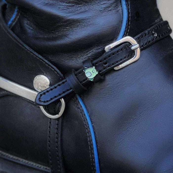 ManeJane frog spur strap fastened on a black English riding boot with a silver spur