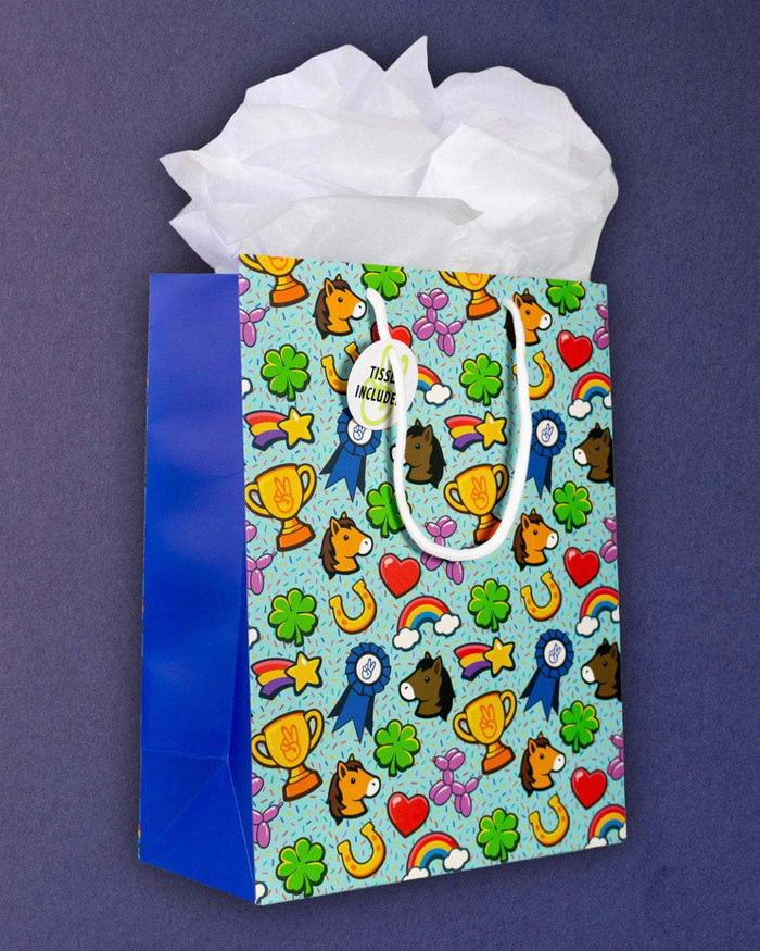 Full O' Luck medium gift bag angled left, royal blue side gusset beside the confetti-flecked front.
