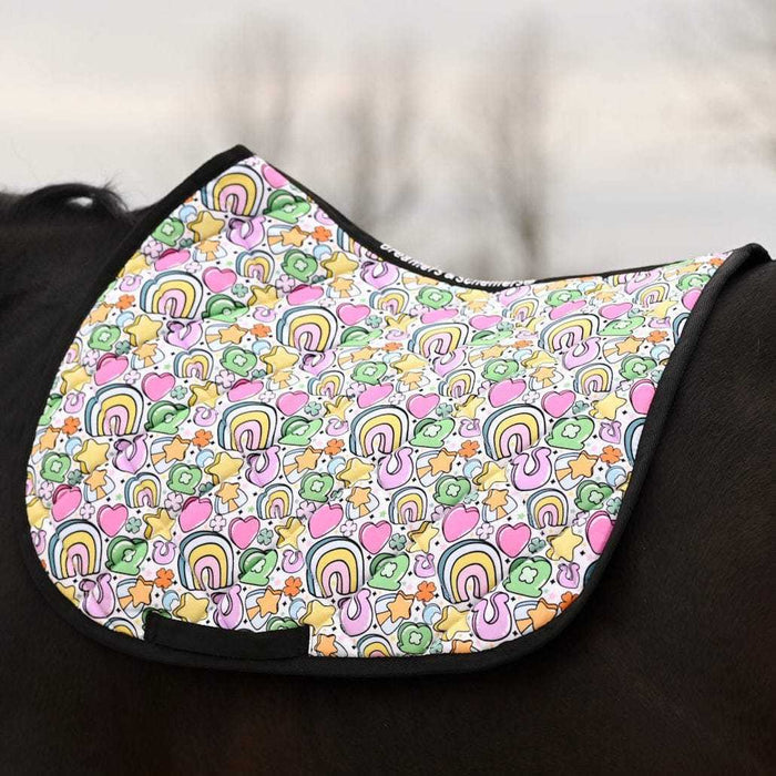 Lucky Equestrian Bundle colorful Full O’ Luck saddle pad with rainbows, hearts, and clovers on horse's back