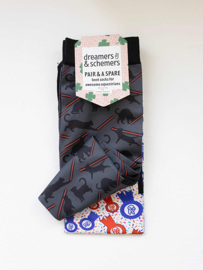 Laser Cats boot socks shown folded with the included spare sock and printed cuff detail