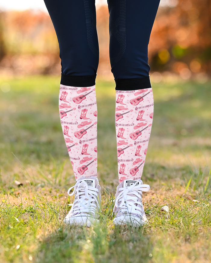 Dolly Forever equestrian boot socks in blush pink, cowgirl boots and guitars print, by Dreamers & Schemers