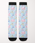 Reading 9-5 socks in soft blue and lavender, full pattern of books, music notes and butterflies