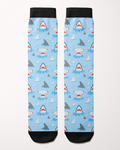 Shark Week Limited Edition equestrian boot socks in blue, flat lay showing the shark-and-fin pattern, by Dreamers & Schemers