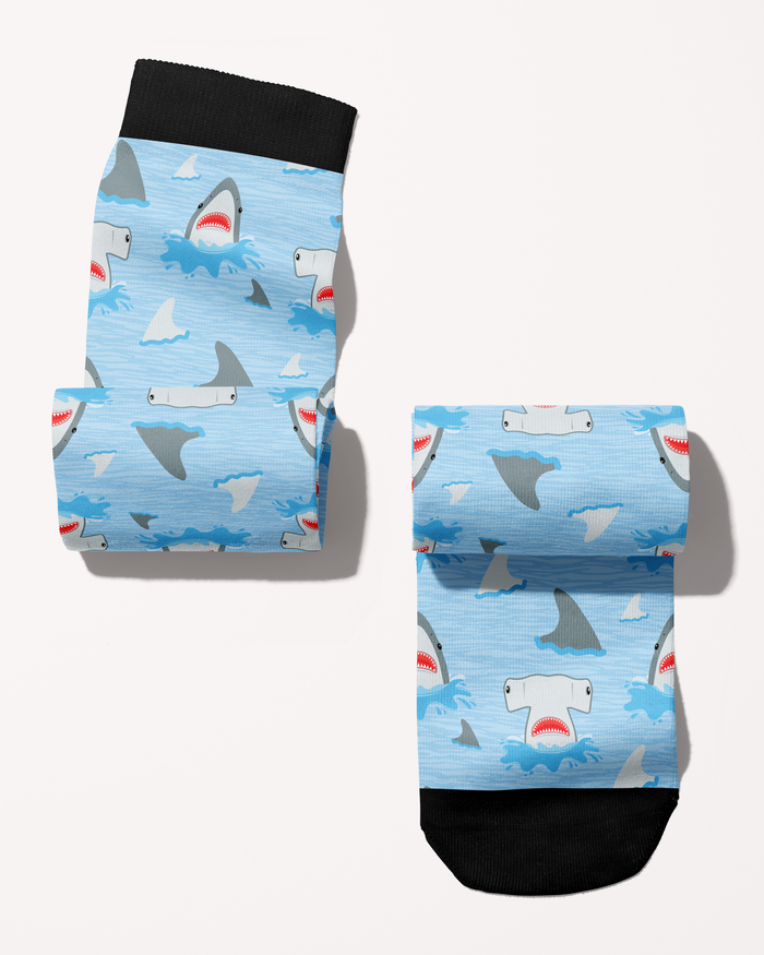 Shark Week boot socks in blue, alternate view showing the black cuff, toe and cartoon shark print