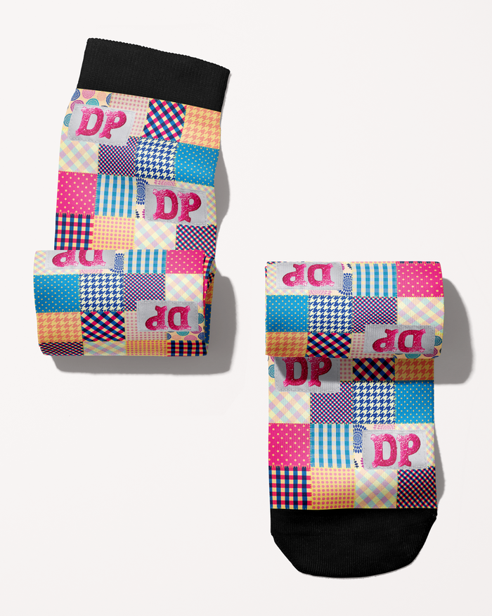 Socks of Many Colors boot socks rolled into a pair, DP patchwork pattern in pink and blue
