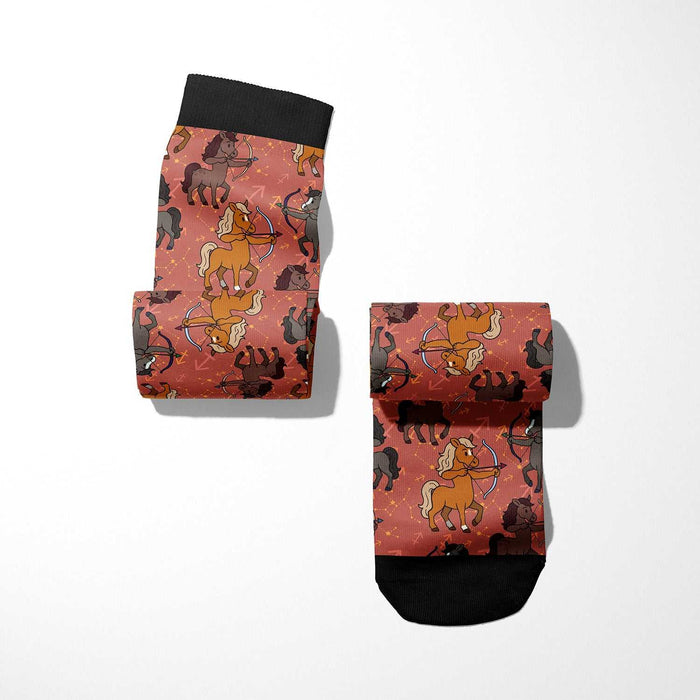 Limited edition Sagittarius zodiac boot socks with horseback riding pattern and black cuffs