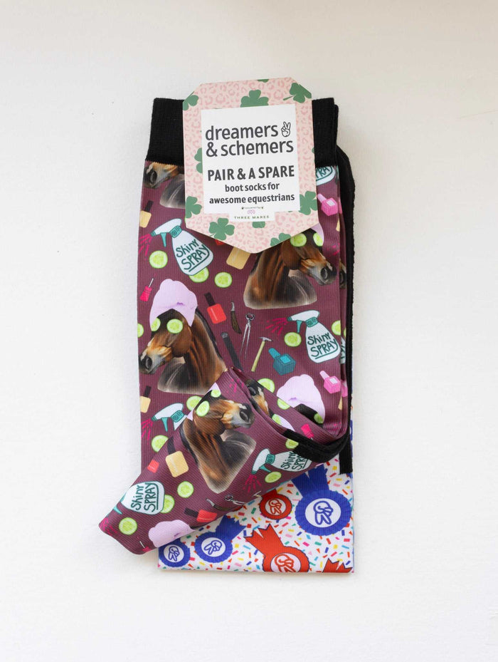 Mani Pedi boot socks shown folded with the included spare sock and printed cuff detail