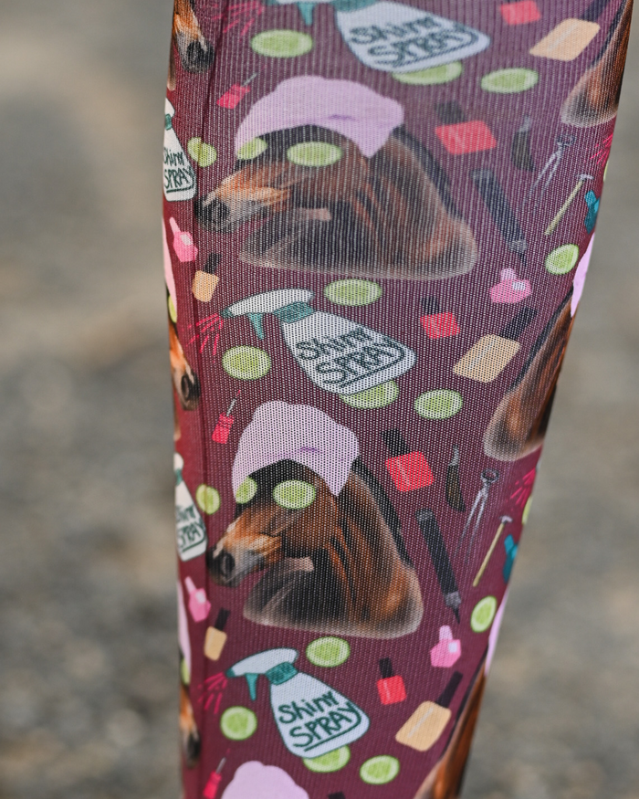 Close crop of the Mani Pedi boot sock print, horses in spa turbans and cucumber slices on deep maroon