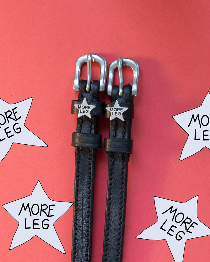 MORE LEG star spur straps on coral with playful cut-out star graphics