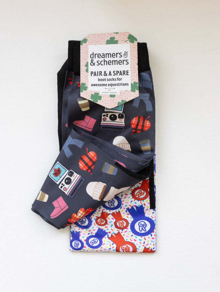 Sept Starter Pack boot socks shown folded with the included spare sock and printed cuff detail