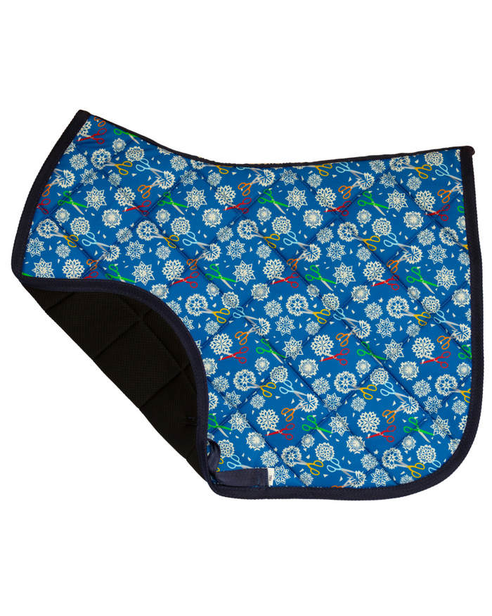 Shear Magic saddle pad folded back to show the breathable mesh underside and quilted lining