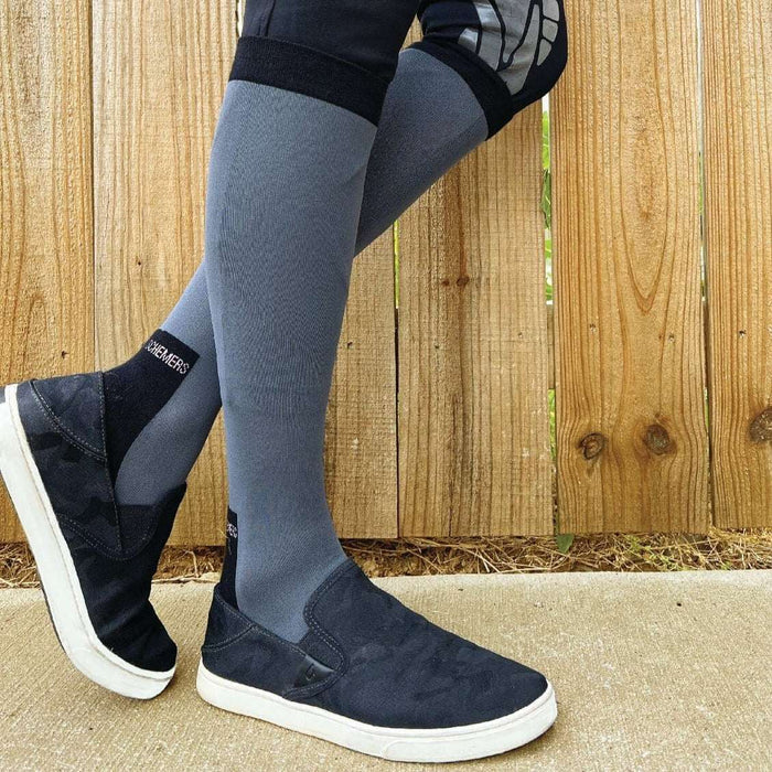 Grey solid color knit socks with stretchy fit and thin cotton terry footbed
