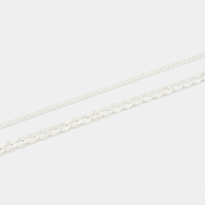 Stack Cuban Chains in Silver for her