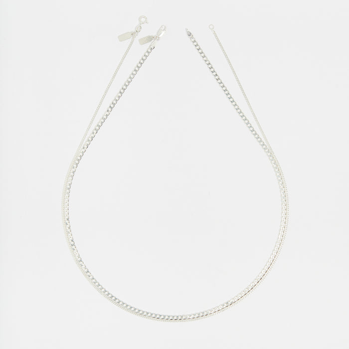 Stack Cuban Chains in Silver for her