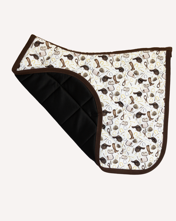 The Hunt saddle pad, corner folded back to reveal the black grippy underside by Dreamers & Schemers