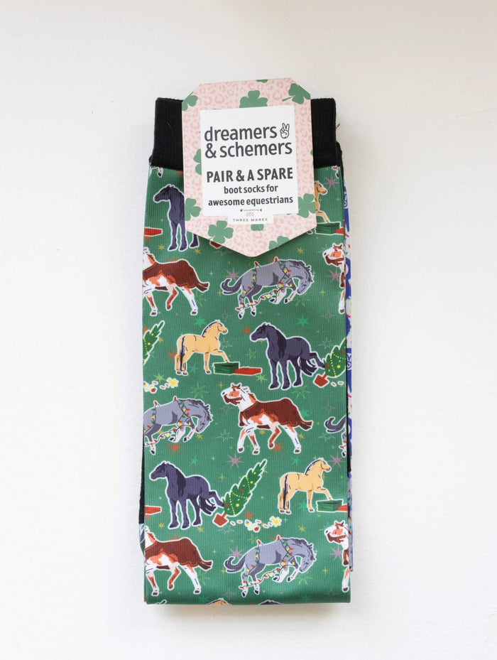 The Naughty List Pair & a Spare equestrian boot socks in their header card, by Dreamers & Schemers
