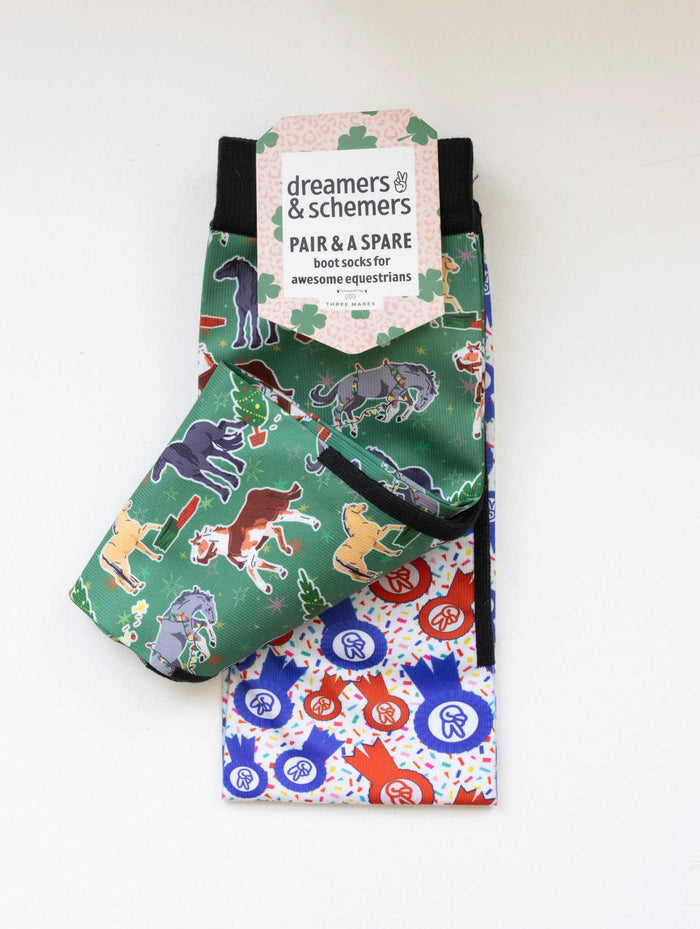 The Naughty List boot socks shown folded with the included spare sock and printed cuff detail