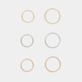 Tiny Hoops in 10k Gold