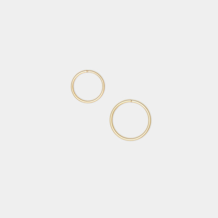 Tiny Hoops in 10k Gold